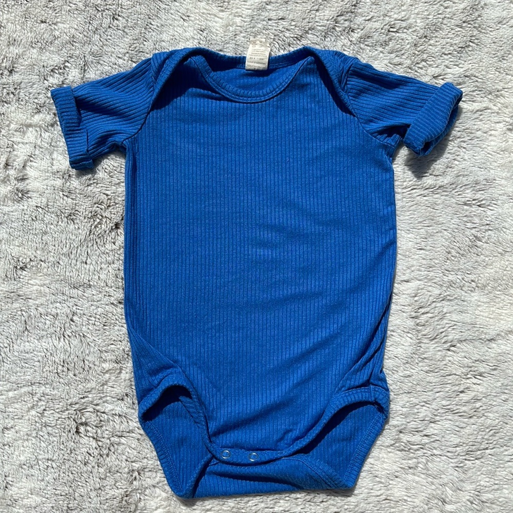 Kate Quinn Blue Ribbed Bodysuit